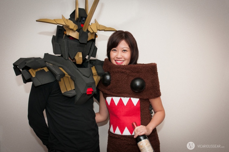 Me and the Mrs We had a buncha fun thinking out the design and making these. A first time for us. Our costumes: Gundam Banshee for me and Domo for her.